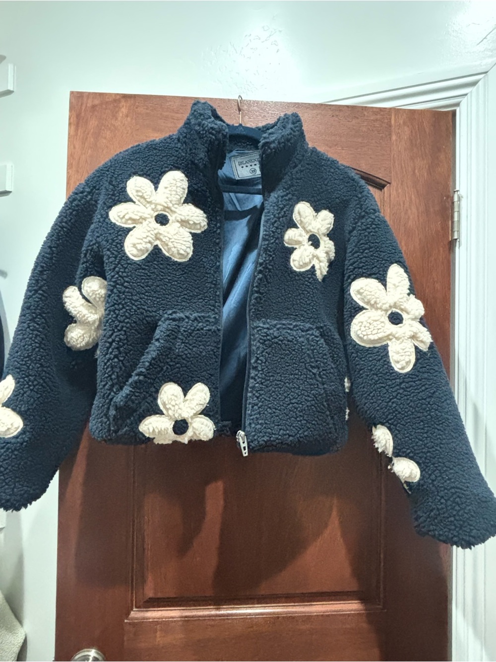Blank NYC Navy Teddy Jacket with Cream Floral Appliqués